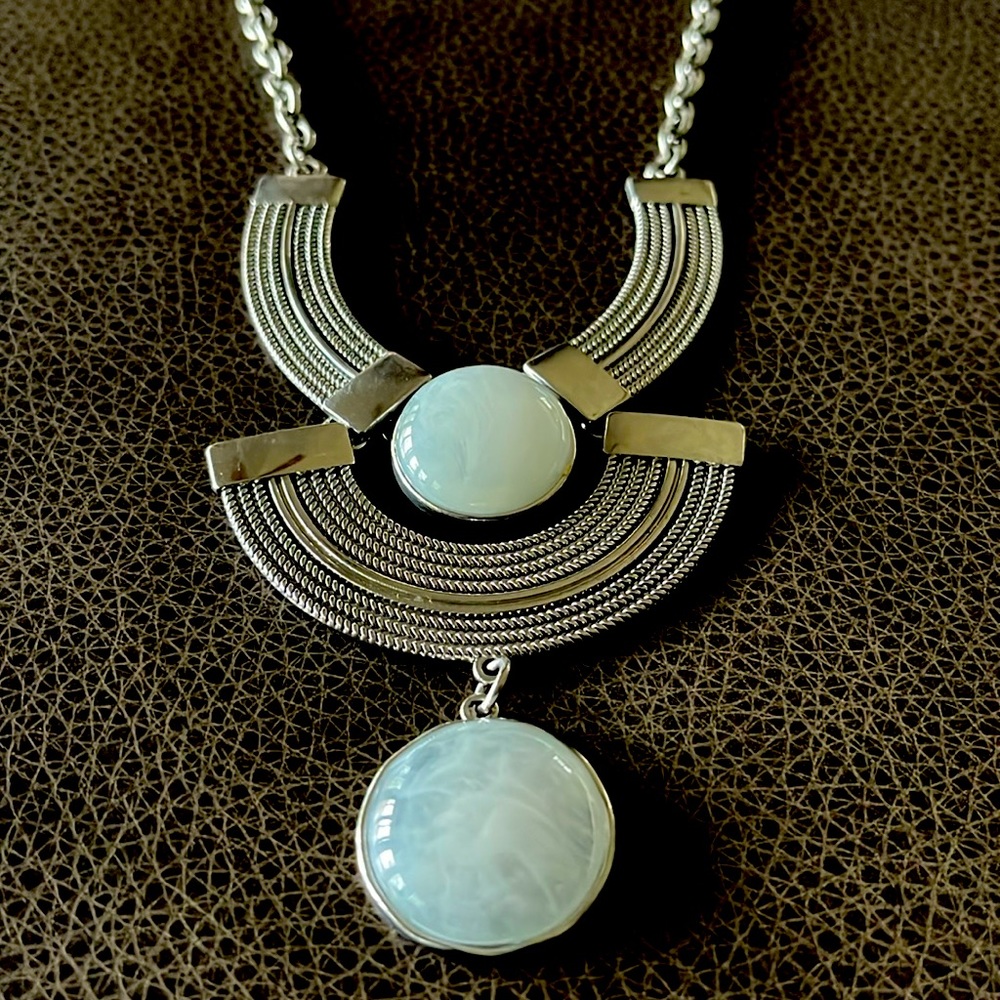 NY&Co. Large statement piece. Silver setting w/ two baby blue stones